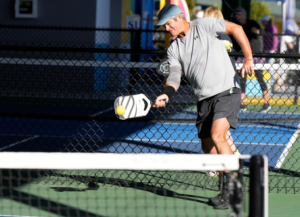 Pickleball players representing 38 states are competing in the AARP Champions Cup Pickleball Tournament through Sunday at Pictona at Holly Hill. The sport's devoted fans call it "a life-changer" for its impact on the mental and physical health of older adults.