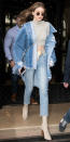 <p>Hadid flashed her killer abs in Paris with a denim-on-denim ensemble of a cut-off Topshop tee ($28; <a rel="nofollow noopener" href="http://click.linksynergy.com/fs-bin/click?id=93xLBvPhAeE&subid=0&offerid=455417.1&type=10&tmpid=8372&RD_PARM1=http%3A%2F%2Fus.topshop.com%2Fwebapp%2Fwcs%2Fstores%2Fservlet%2FProductDisplay%3FsearchTermScope%3D3%2526searchType%3DALL%2526viewAllFlag%3Dfalse%2526beginIndex%3D1%2526langId%3D-1%2526productId%3D25825006%2526pageSize%3D20%2526defaultGridLayout%3D3%2526CE3_ENDECA_PRODUCT_ROLLUP_ENABLED%3DN%2526searchTerm%3DTS09L01KCRM%2526productOnlyCount%3D1%2526catalogId%3D33060%2526productIdentifierproduct%3Dproduct%2526geoip%3Dsearch%2526x%3D25%2526searchTermOperator%3DLIKE%2526sort_field%3DRelevance%2526y%3D11%2526storeId%3D13052%2526qubitRefinements%3DsiteId%253DTopShopUS&u1=ISNEWSGigiTop3.2OB" target="_blank" data-ylk="slk:topshop.com;elm:context_link;itc:0;sec:content-canvas" class="link ">topshop.com</a>) with frayed-hem jeans and an oversize denim jacket. The model accessorized with second-skin booties (try a similar pair from <a rel="nofollow noopener" href="http://click.linksynergy.com/fs-bin/click?id=93xLBvPhAeE&subid=0&offerid=455417.1&type=10&tmpid=8372&RD_PARM1=http%3A%2F%2Fus.topshop.com%2Fen%2Ftsus%2Fproduct%2Fshoes-70484%2Fankle-boots-4979423%2Fhollywood-sock-boots-6184202%3Fbi%3D20%2526ps%3D20&u1=ISNEWSGigiBoots3.2OB" target="_blank" data-ylk="slk:Topshop;elm:context_link;itc:0;sec:content-canvas" class="link ">Topshop</a>), a crossbody bag with a chain-link strap, and round sunglasses by KREWE ($275; <a rel="nofollow noopener" href="https://www.krewe.com/collections/ward/products/ward-24-k-titanium-zulu" target="_blank" data-ylk="slk:krewe.com;elm:context_link;itc:0;sec:content-canvas" class="link ">krewe.com</a>).</p>