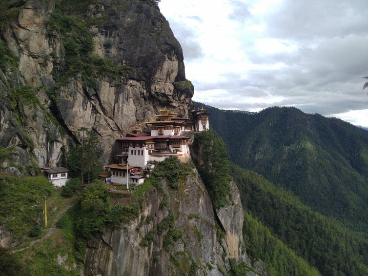 <span class="caption">In Bhutan, humans live largely in harmony with the natural world.</span> <span class="attribution"><a class="link " href="https://unsplash.com/photos/iKIVrqx7yUQ" rel="nofollow noopener" target="_blank" data-ylk="slk:Pulak Bhagawati/Unsplash;elm:context_link;itc:0;sec:content-canvas">Pulak Bhagawati/Unsplash</a>, <a class="link " href="http://creativecommons.org/licenses/by-sa/4.0/" rel="nofollow noopener" target="_blank" data-ylk="slk:CC BY-SA;elm:context_link;itc:0;sec:content-canvas">CC BY-SA</a></span>