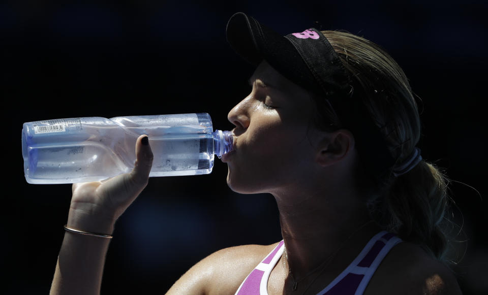 United States' Danielle Collins takes a drink during her semifinal against Petra Kvitova of the Czech Republic at the Australian Open tennis championships in Melbourne, Australia, Thursday, Jan. 24, 2019. (AP Photo/Mark Schiefelbein)