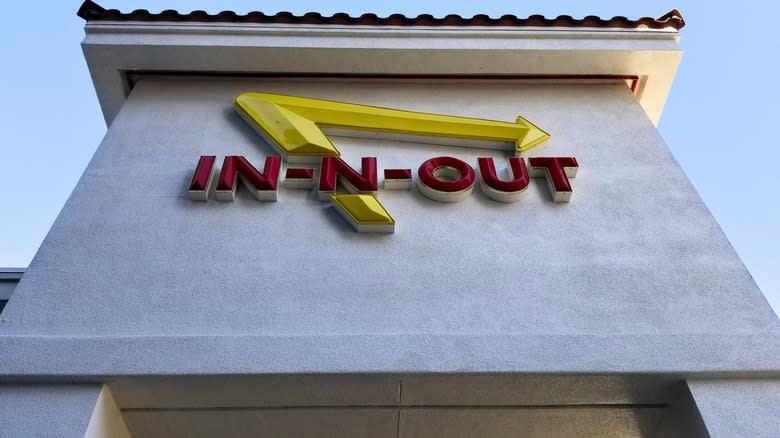 looking up at In-N-Out sign on restaurant