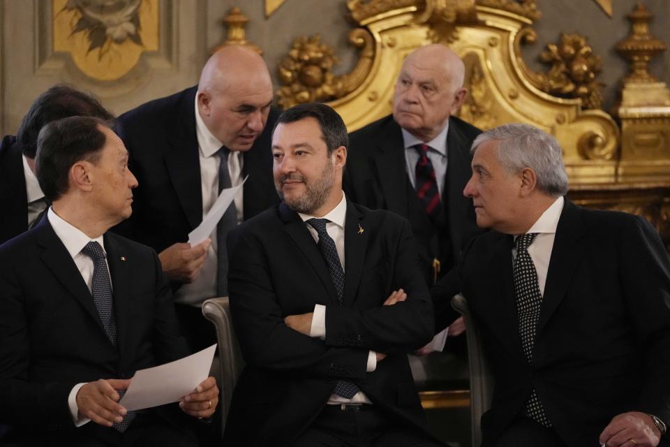 From left, Italy's new government Minister of relations with the parliament Luca Ciriani, Infrastructure, sustainable mobility and Vice premier Matteo Salvini, Foreign minister and Vice premier Antonio Tajani, Defense Minister Guido Crosetto, top left, and Justice Minister Carlo Nordio attend the swearing in ceremony of Italy's first far-right-led government since the end of World War II at Quirinal presidential palace in Rome, Saturday, Oct. 22, 2022. (AP Photo/Alessandra Tarantino)