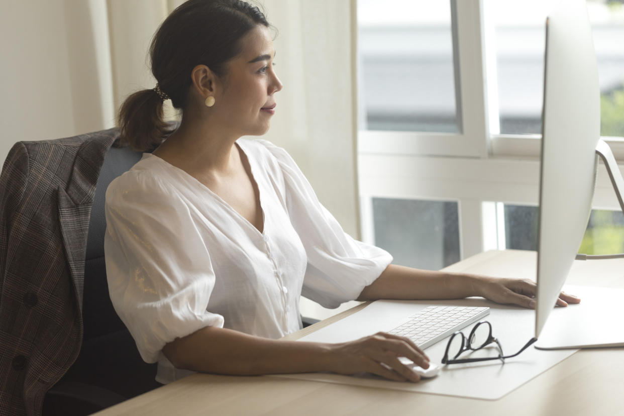 An investor reviewing her investment portfolio.