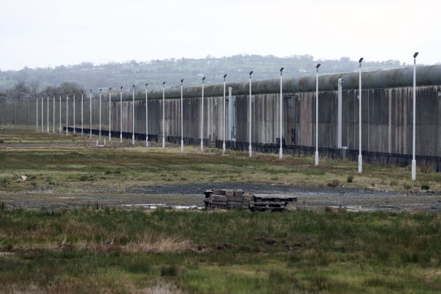 File photo dated 18/4/2015 of the no-mans-land within Maghaberry prison in Northern Ireland which has become a sanctuary for Lapwings, one of the world's most threatened birds. PRESS ASSOCIATION Photo. Picture date: Monday April 20, 2015. Life sentence prisoners helped create the habitat for around 20 pairs of breeding lapwings which have made their home at HMP Maghaberry on a marshy no-man's-land dominated by razor wire and lookouts behind reinforced glass. See PA story ULSTER Maghaberry. Photo credit should read: Niall Carson/PA Wire