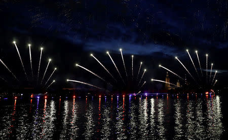 Fireworks explode along the Neva River, the during the Scarlet Sails festivities marking school graduation, in St. Petersburg, Russia,June 24, 2018. REUTERS/Henry Romero