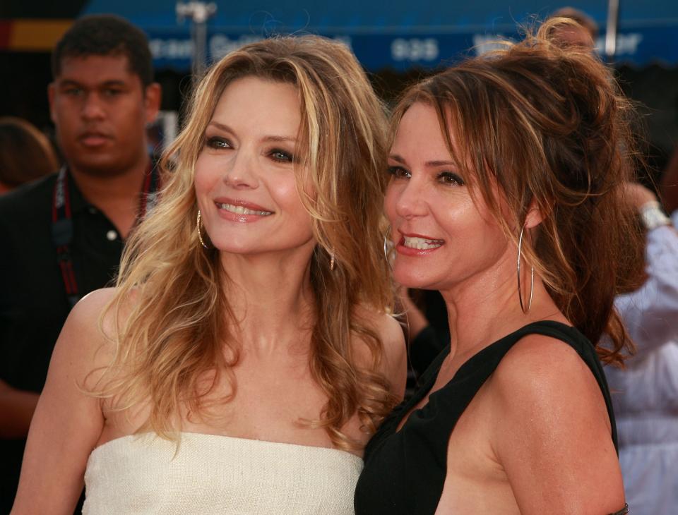 WESTWOOD, CA - JULY 10:  Actresses Michelle Pfeiffer and sister Dedee Pfeiffer arrive to the Los Angeles premiere of New Line Cinema's 