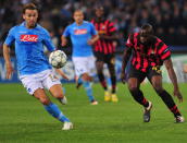 Napoli's Argentine defender Hugo Armando Campagnaro (L) fights for the ball with Manchester City's English forward Alex Nimely during the Champions League group A football match SSC Napoli vs Manchester City on November 22, 2011 at the San Paolo stadium in Naples . AFP PHOTO / ALBERTO PIZZOLI (Photo credit should read ALBERTO PIZZOLI/AFP/Getty Images)