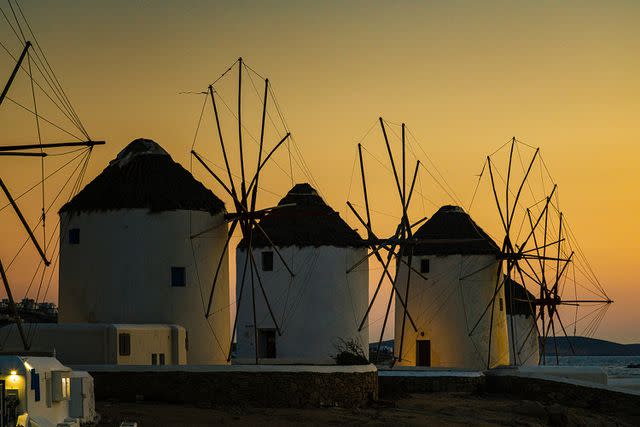 <p>Getty</p> Windmills in the town of Chora, Greece