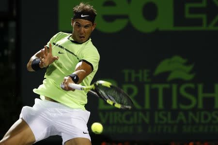 Mar 29, 2017; Miami, FL, USA; Rafael Nadal of Spain hits a forehand against Jack Sock of the United States (not pictured) on day nine of the 2017 Miami Open at Crandon Park Tennis Center. Nadal won 6-2, 6-3. Geoff Burke-USA TODAY Sports