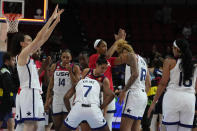 United States' Breanna Stewart, left, gestures to the crowd following her teams win over Serbia in their quarterfinal game at the women's Basketball World Cup in Sydney, Australia, Thursday, Sept. 29, 2022. (AP Photo/Mark Baker)