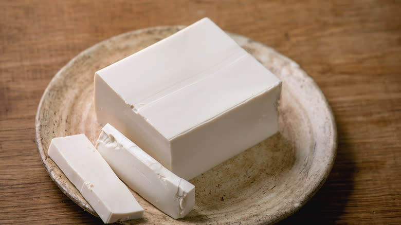 Block of tofu on plate
