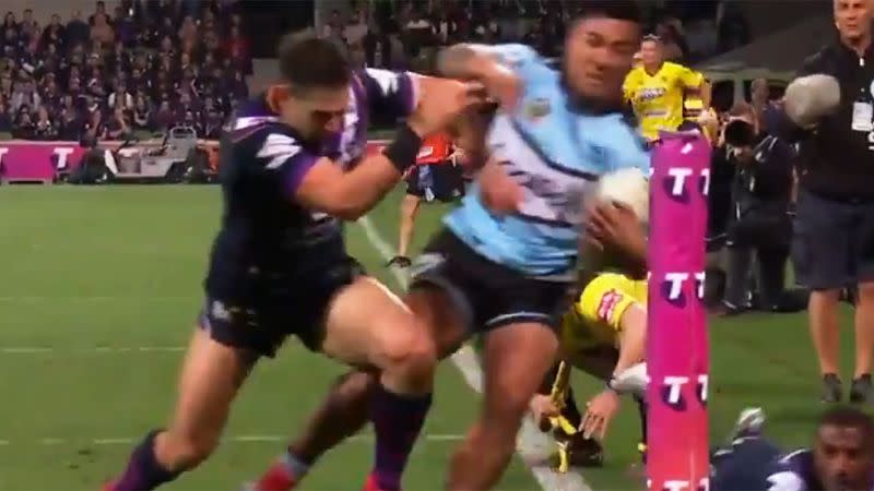 The Billy Slater shoulder charge on Cronulla’s Sosaia Feki. Pic: WWOS