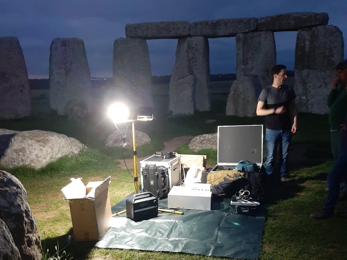 The team from Aberystwyth University carrying out new analysis of the Altar Stone, finding it did not come from south Wales (Richard Bevin)