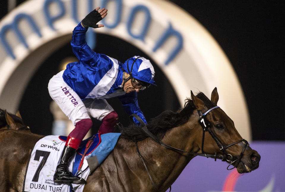 Lord North with jockey Frankie Dettori wins Group 1 Dubai Turf over 1800m (9 furlongs) at the Meydan racecourse in Dubai, United Arab Emirates, Saturday, March 25, 2023. (AP Photo/Martin Dokoupil)