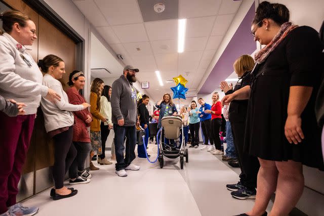 <p>Bonnie Ryan/Children's Nebraska</p> Jagger's doctors and nurses lined the hallways to say goodbye on Oct. 10, 2023.