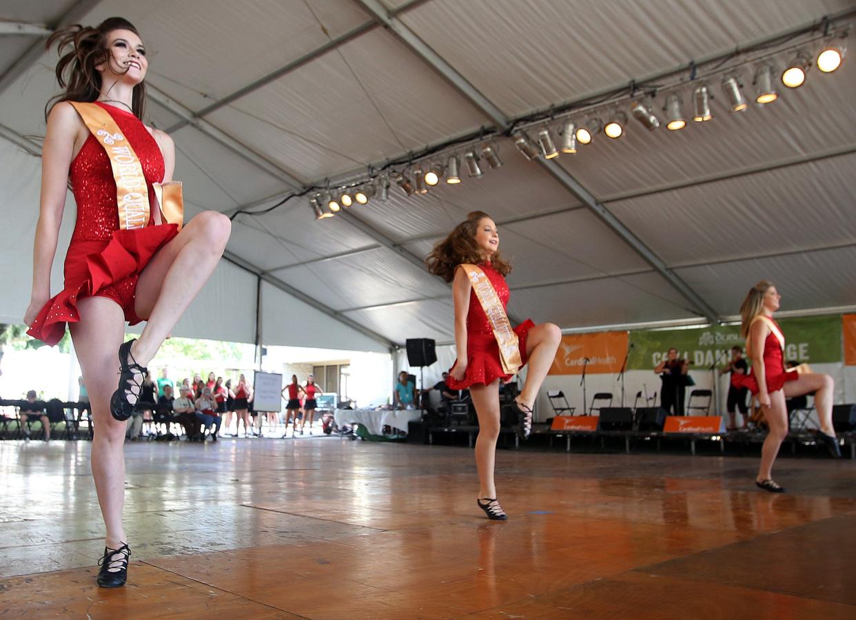 Aubrey Chann, Audrey Sturgen, and Claire Allen with Millennium Academy of Irish Dance and Music perform on the Ceili Dance Stage during opening day of a previous Dublin Irish Festival.