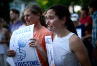 <p>Betsy Custis, right, and others attend a march in honor of Justine Damond at Beard’s Plaissance Park, Thursday, July 20, 2017, in Minneapolis, Minn. (Photo: Aaron Lavinsky/Star Tribune via AP) </p>