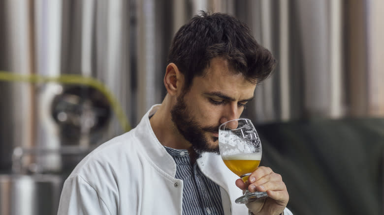 Man smelling beer during a tasting