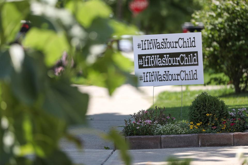 Belinda Velasquez keeps a sign in her front yard reading #WhatIfItWasYourChild, which is a group of parents hoping to raise awareness of contaminants caused by an industrial site in Franklin, Ind. Many in the community have raised concerns if the high rates of childhood cancer in Johnson County are being caused by contamination. Velasquez's freshman daughter is in remission after a more than two year battle with leukemia. 