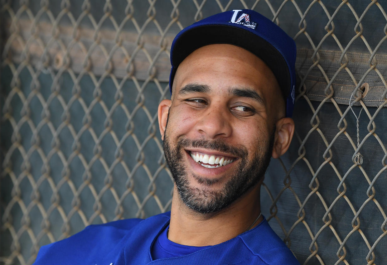 Feb 21, 2020; Glendale, Arizona, USA;  Los Angeles Dodgers starting pitcher David Price (33) sits in the dugout during spring training at Camelback Ranch. Mandatory Credit: Jayne Kamin-Oncea-USA TODAY Sports