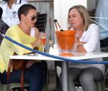 Charlize Theron is spotted sporting a dark buzz-cut at a trendy eatery with her mother, Gerda, in Cape Town, South Africa on November 16, 2012. The actress, who is in Cape Town to shoot the final scenes for the Australian blockbuster "Mad Max 4: Fury Road", chopped off her long mane for the role. <br><br> Photo by Esa Alexander / Sunday Times / Gallo Images / Getty Images)