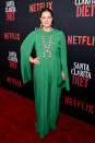 <p>Actress Drew Barrymore chose a spring-ready caped green dress for her most recent red carpet appearance. <em>[Photo: Getty]</em> </p>
