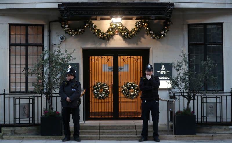 Police officers stand outside King Edward VII's Hospital, where Britain's Prince Philip was admitted, in London