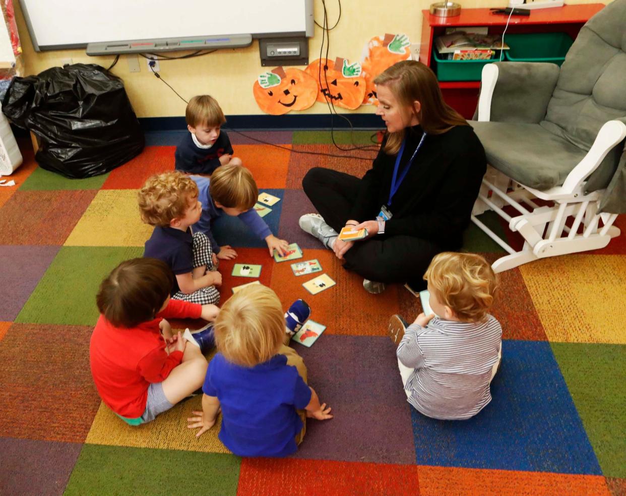 Teacher Mary Holland Morris works with her students during class at Presbyterian Day School, located at 4025 Poplar Ave., in Memphis, on Nov. 9, 2023.