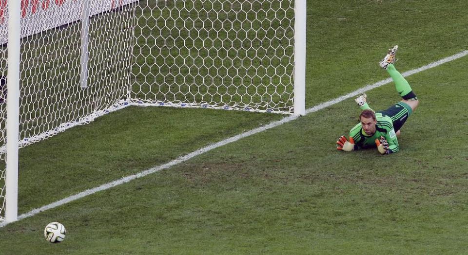 Germany&#39;s goalkeeper Manuel Neuer eyes the ball as it goes out after a shot by Argentina&#39;s Gonzalo Higuain, not seen, during the World Cup final soccer match between Germany and Argentina at the Maracana Stadium in Rio de Janeiro, Brazil, Sunday, July 13, 2014. (AP Photo/Hassan Ammar)