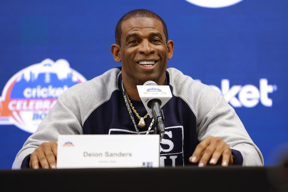 Deion Sanders speaks during a news conference for the Celebration Bowl NCAA college football game between North Carolina Central and Jackson State, Friday, Dec. 16, 2022 in Atlanta. Jackson State is looking to wrap up its first undefeated season in its final game under coach Deion Sanders, who has been hired as Colorado's coach. (AP Photo/Todd Kirkland)