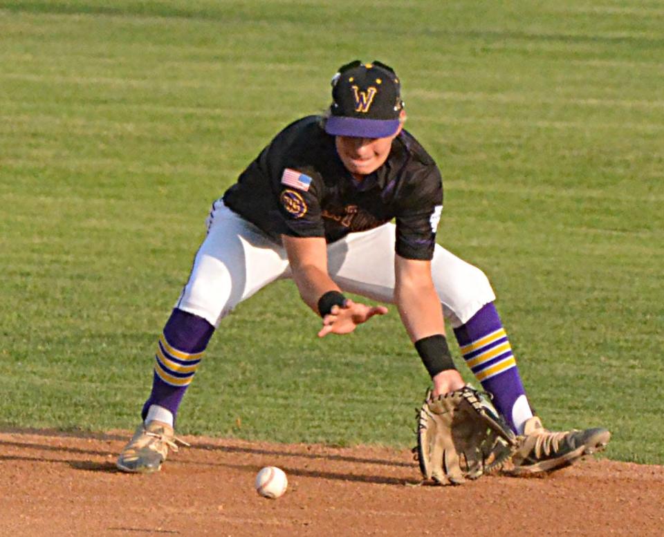 Watertown Post 17 second baseman Treyton Himmerich attempts to a fielder a ground ball during Game 1 of a best-of-three American Legion Baseball regional playoff series against the Aberdeen Smittys on Thursday, July 20, 2023 at Watertown Stadium. Aberdeen won 15-4.