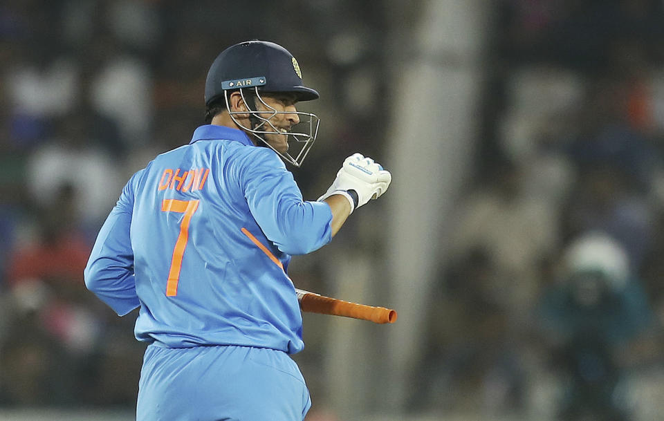 India's Mahendra Singh Dhoni celebrates between runs during the first one day international cricket match between India and Australia, in Hyderabad, India, Saturday, March 2, 2019. (AP Photo/Mahesh Kumar A.)