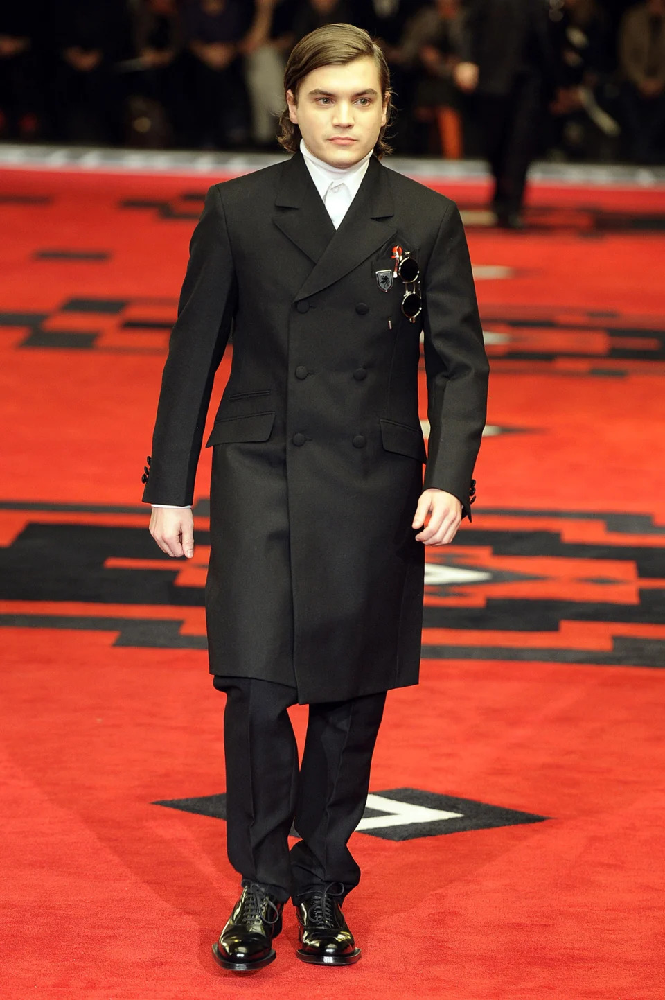 prada villains fashion show runway, MILAN, ITALY - JANUARY 15:  Actor Emile Hirsch walks the runway at the Prada Autumn Winter 2012 fashion show during Milan Menswear Fashion Week on January 15, 2012 in Milan, Italy.  (Photo by Chris Moore/Catwalking/Getty Images)