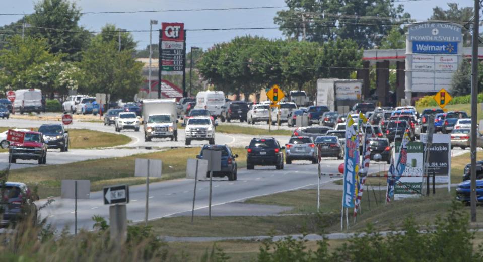 Traffic moves North and South near the Anderson County line on State Highway 153, an often congested road in Powdersville, S.C. July 1, 2022.