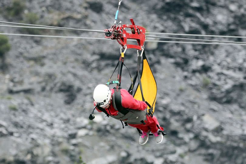 Adrenalin seekers can tackle the fastest zip wire in Europe at ZIp World at Penrhyn Quarry in Bethesda, like this daredevil customer