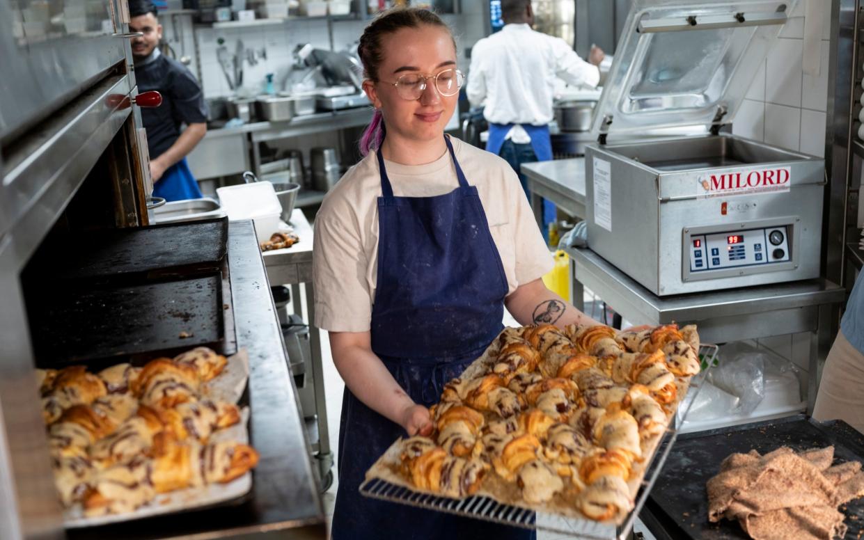 The crossant is cooled before cookie dough is inserted and  more is placed on top