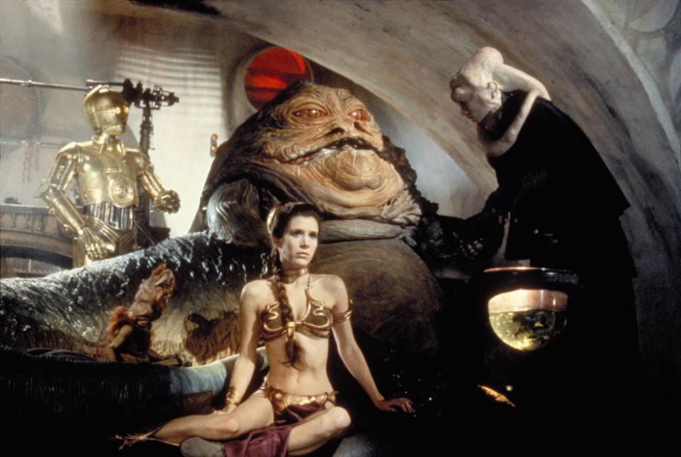 Apropos Jabba der Hutte: Diese - nunja - fette Schnecke herrschte eine Zeit lang über die Unterwelt auf dem Wüstenplaneten Tatooine, hielt sich Rancors als Haustiere und fand in "Episode 6: Die Rückkehr der Jedi-Ritter" ein jähes, zappelndes Ende durch die Hand der zierlichen Prinzessin Leia. (Bild: Fox / Lucasfilm Ltd. & TM / Disney All rights reserved)