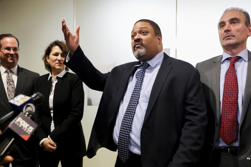 Manhattan District Attorney Alvin Bragg, center, surrounded by his legal team, speaks to the media after the jury found the Trump Organization guilty on all counts in a criminal tax fraud case, Tuesday, Dec. 6, 2022, in New York. (AP Photo/Julia Nikhinson)