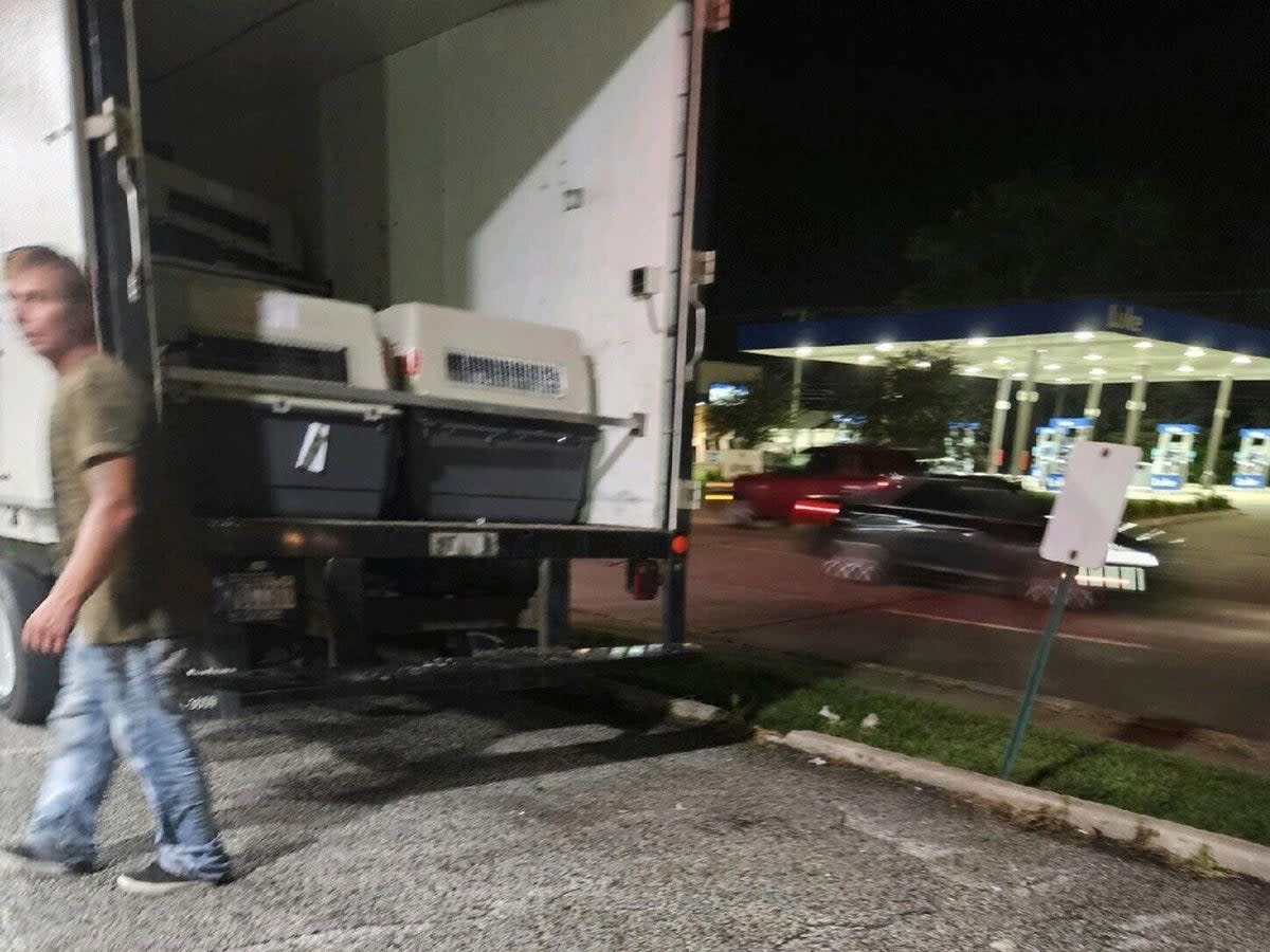 This photo provided by the Humane Society of Hobart, Ind., shows a cargo van, in Lake Station, Ind., in which dogs were being transported from Chicago's O'Hare International Airport to a K-9 training facility in Michigan City, Ind., Thursday, July 27, 2023. (AP)