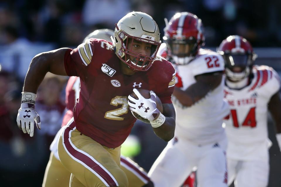 Boston College running back AJ Dillon (2) runs for a touchdown during the second half of an NCAA college football game against North Carolina State in Boston, Saturday, Oct. 19, 2019. (AP Photo/Michael Dwyer)