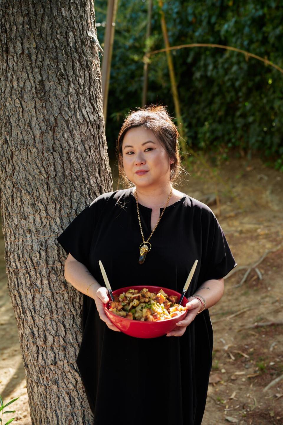 Jing Gao cooks in her kitchen