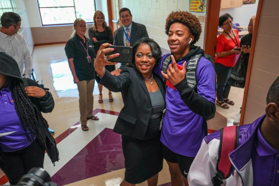 Cincinnati Public Schools Superintendant and CEO, Iranetta Rayborn Wright tours Aiken High School on the first day of school on Thursday August 18, 2022. Wright walked around, greeting students and staff and taking selfies with them.