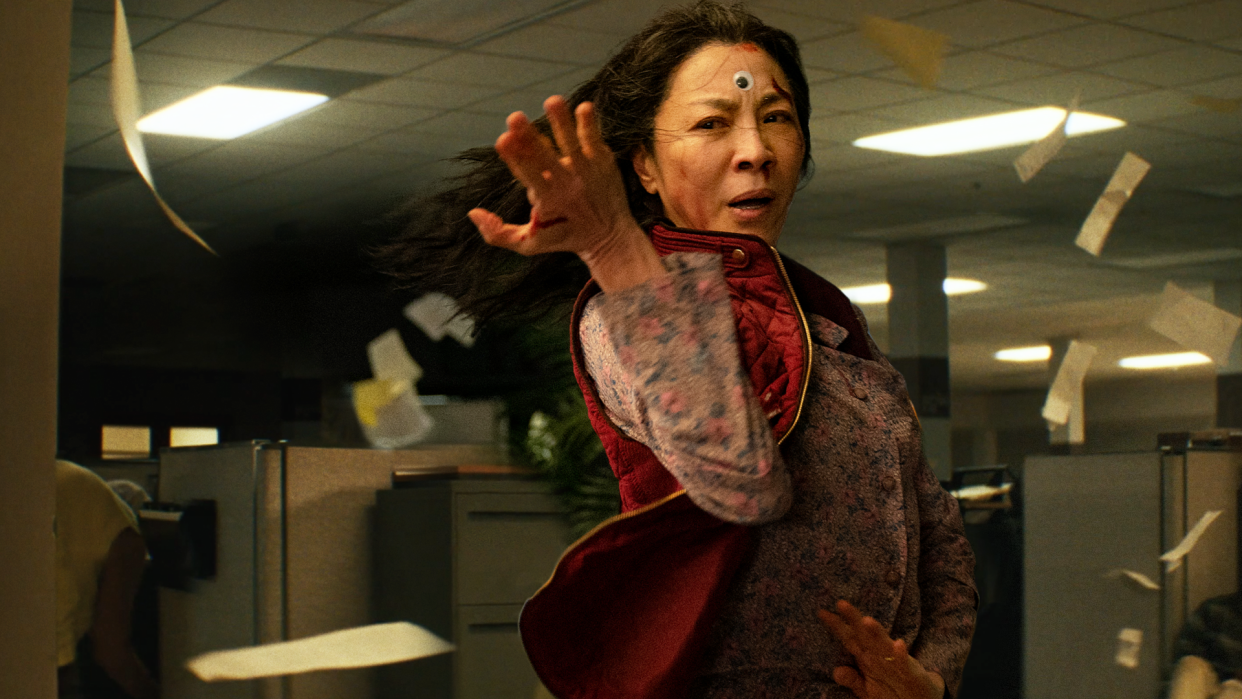 Michelle Yeoh showcases her martial arts skills in "Everything Everywhere All at Once," a sci-fi film with an absurdist comedic bent.