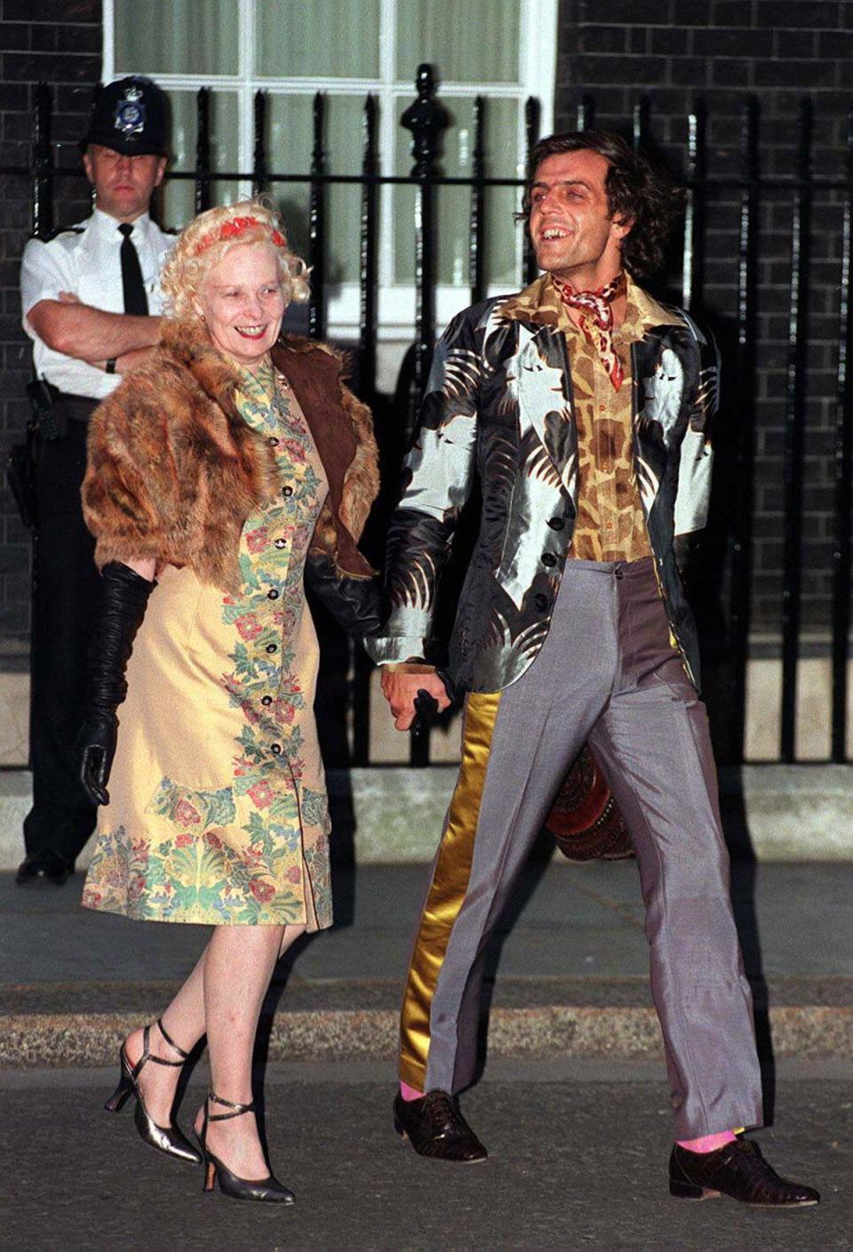 Westwood and Kronthaler leaving Tony Blair’s Downing Street party in 1997 (Alamy)