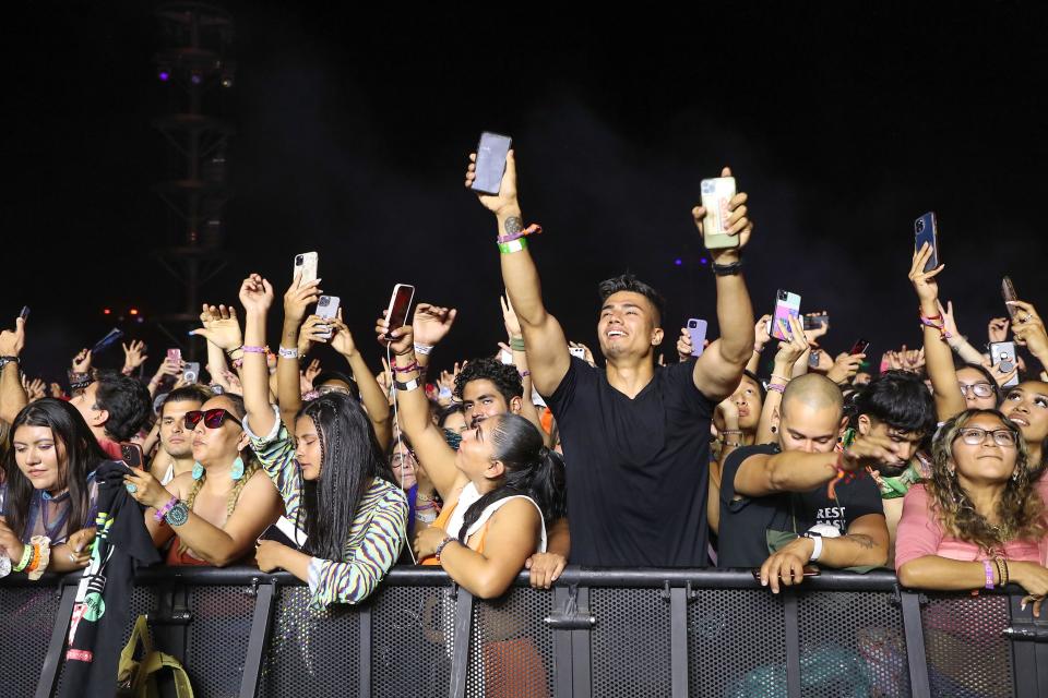 Fans watch Swedish House Mafia perform on the Coachella Stage of the Coachella Valley Music and Arts Festival in Indio, Calif., Sunday, April 24, 2022.