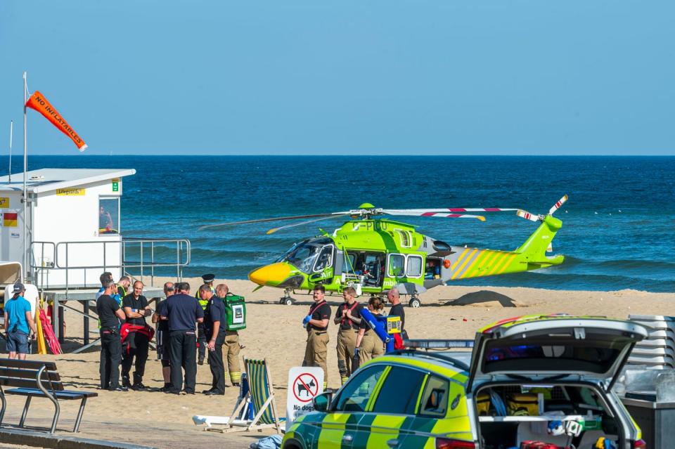 Other witnesses who were on the beach at the time of the incident reported seeing the body of a young male wash up on the shore, as well as lifeguards pulling a girl from the sea next to the pier (Max Willcock/BNPS)