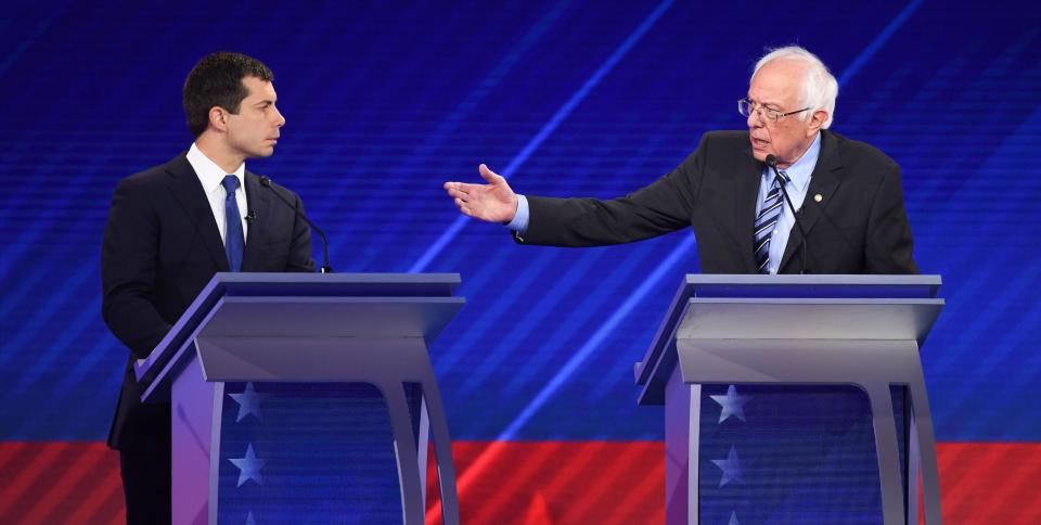 Democratic presidential hopefuls Mayor of South Bend, Indiana, Pete Buttigieg (left) and Sen. Bernie Sanders of Vermont (right) speak during the third Democratic primary debate of the 2020 presidential campaign season on Sept. 12, 2019. (Photo: ROBYN BECK via Getty Images)