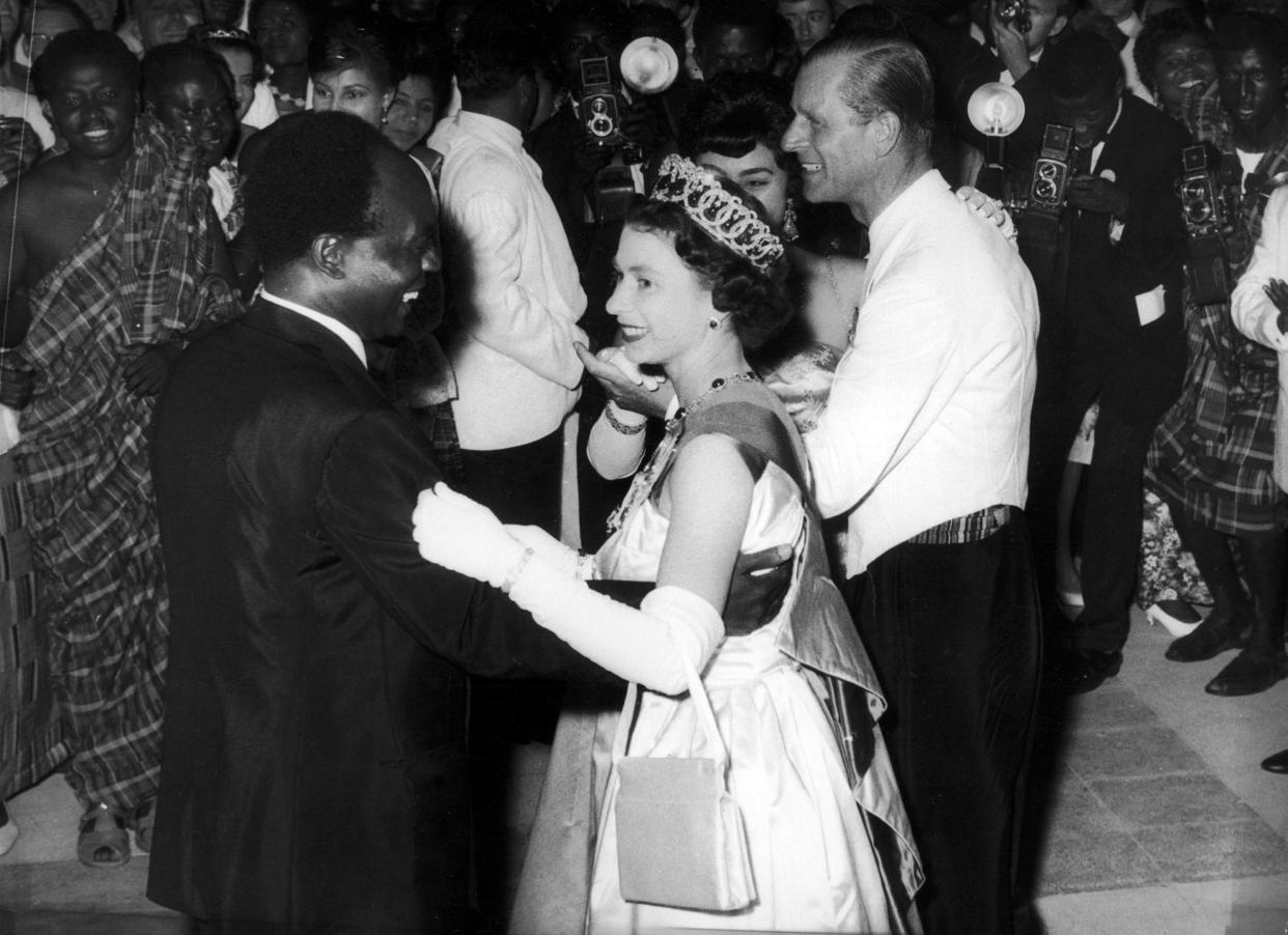 Queen Elizabeth II of Great Britain dances with President Kwame Nkrumah of Ghana, during her visit to Accra, Ghana, in 1961. (Photo by: Universal History Archive/ Universal Images Group via Getty Images)