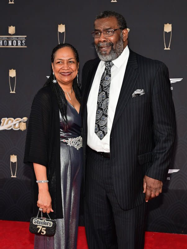 Retired Pittsburgh Steelers tackle "Mean" Joe Greene arrives with a guest on the red carpet at the Adrienne Arsht Center for the NFL Honors during Super Bowl LIV week in Miami on February 1, 2020. The football star turns 77 on September 24. File Photo by David Tulis/UPI