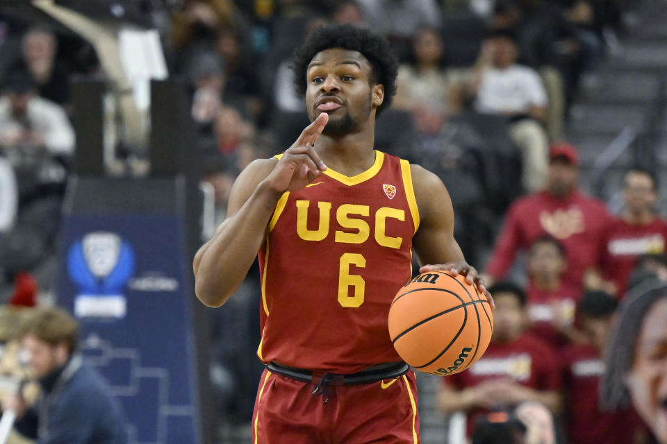 LAS VEGAS, NEVADA - MARCH 13: Bronny James #6 of the USC Trojans handles the ball in the first half of a first round game against the Washington Huskies during the Pac-12 Conference basketball tournament at T-Mobile Arena on March 13, 2024 in Las Vegas, Nevada. The Trojans defeated the Huskies 80-74. (Photo by David Becker/Getty Images)